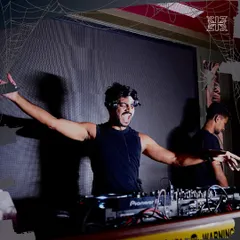 Arms wide open, bringing the energy to a Halloween party. Themed events are a chance to get creative with both the music and the look.