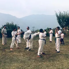 A core part of our gasshuku is intense kumite, or sparring, in an open environment. Here, students practice self-defense techniques and combinations, applying their skills with focus and discipline against the backdrop of the mountains.