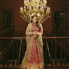 A full-length view of the bride's magnificent anarkali. The intricate embroidery and regal silhouette make this a show-stopping look for a Sufi night.
