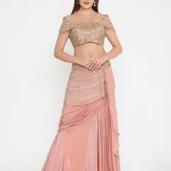 A full view of the custom peach draped gown, showcasing the unique silhouette and how the hand-worked details come together for a stunning final look.