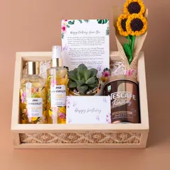 A birthday hamper is more than a gift; it's a personal message. This 'Tropical Dream' hamper was curated with a handwritten letter, fragrant body care, a favorite coffee, a live succulent, and handmade crochet sunflowers to make someone's day truly special.