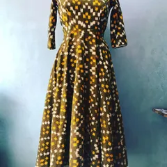 This unique Anarkali was created from an ikat weave saree. The full-flair design showcases the fabric's pattern, and I added a simple border for a clean finish.