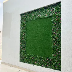 A closer look at the framed green wall in Himachal. The detail in the flowering border adds depth and realism to the installation.