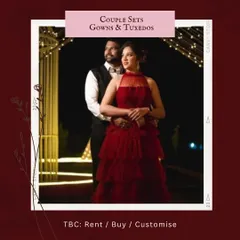 An intimate and elegant evening look for your pre-wedding shoot. This couple is perfectly coordinated with her in a tiered red gown and him in a classic black vest and trousers. This rental set is ideal for romantic, softly lit photos.