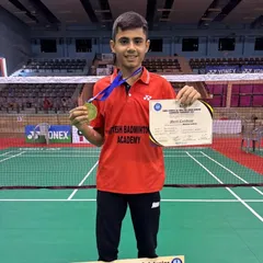 This is what victory looks like. Our student proudly displays his gold medal and merit certificate after winning the All India Sub Junior National Ranking tournament.