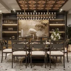This dining space blends tradition with neoclassical charm. A handcrafted wooden false ceiling adds warmth, while intricate brass inlays on the floor create the illusion of a luxurious carpet, blending artistry with architecture.