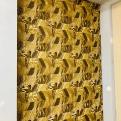 This wallpaper features a repeating geometric pattern with a natural, earthy color palette. It's a great way to add texture and a modern, structured look to a wall.