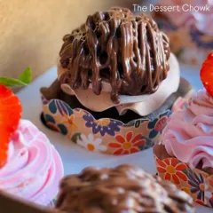 A detailed shot of my Nutella Mousse cupcake. This chocolate cupcake is topped with a rich Nutella mousse and a generous drizzle of more Nutella.