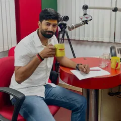 During an interview at the Radio Mirchi studio. I use media platforms to share my story and promote upcoming running events to a wider audience.