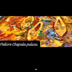 This is my personal favorite, the authentic Nellore Chepala Pulusu. It's a tangy and spicy fish curry made with a special blend of spices that gives it that true Nellore flavor.
