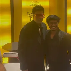 Here is RJ Raghav with host Karan Johar. For this event, I tailored a black textured jacket that was both stylish and camera-ready, ensuring my client looked his best in the spotlight.