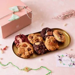 A delightful assortment of our most popular chunk cookies, perfect for a Rakhi gift box or any celebration. Flavors include classic chocolate chunk, red velvet, and s'mores.