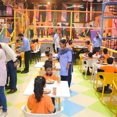 A wide view of our café area, bustling with happy and hungry kids from a school trip refueling for their next adventure.