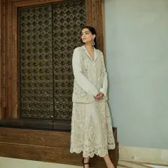 A full-length shot of Sonam Kapoor in a beautiful lace outfit from Studio Moonray, showcasing a modern take on romantic dressing.