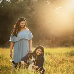 The golden hour light hitting this field was just magical. It created the perfect dreamy atmosphere for this mother, daughter, and their sweet indie dog, Oreo. These are the warm, glowing memories I love to create.