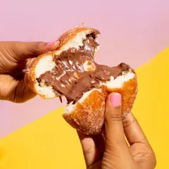 This is for all the chocolate lovers. My Nutella Stuffed Donuts are light, airy, and packed with a generous amount of gooey Nutella. Every single one of my desserts is 100% eggless.