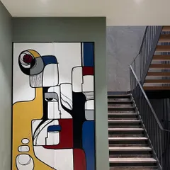 A view of the completed wardrobe in the hallway, showing how it complements the modern interior design of the home.