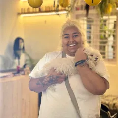 A happy client and her even happier fur baby. We love it when you bring your pets along. Our salon is a safe and welcoming space for all members of your family, especially the four-legged ones.