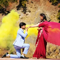 A dramatic proposal shot with a burst of yellow smoke, adding energy and color to this special moment.