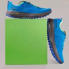 A creative composition of Skechers Go Run shoes with a vibrant green block. This type of shot adds a graphic, modern element to product photography, making it stand out in a crowded market.