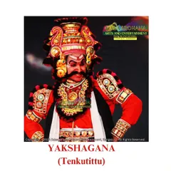 A close-up of a Yakshagana artist in the Tenkutittu style, known for its distinct costume and dynamic movements. We are one of the few troupes that offer authentic performances in this specific regional style.