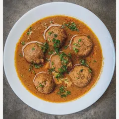 This is my Khaima Unde Saaru, a flavour bomb of a curry made with hand-minced Bannur mutton meatballs. The gravy is enriched with bone marrow and a secret blend of homemade spices, making it earthy and deeply satisfying.