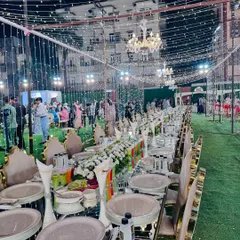 This is the standard I set for a grand celebration. A beautifully arranged sit-down dinner with mirrored tables reflecting the fairy lights, elegant floral centerpieces, and impeccable place settings, all ready for your guests to arrive.