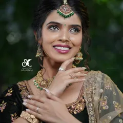 A close-up shot highlighting the exquisite makeup and jewelry. My job is to capture the artistry of the entire team, from the MUA to the jewelry designer.