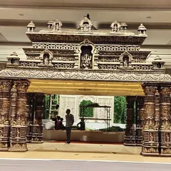 A grand entrance sets the tone for the wedding. This temple-style gate was designed to match the main stage, creating a cohesive and impressive welcome for guests.