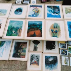 A collection of Nazia Rushdi's conceptual artworks, laid out for viewing. Her pieces have been exhibited in numerous prestigious shows, and we are proud to showcase her talent.