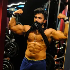 Confidence comes from seeing the results of your dedication. A defined midsection and strong biceps are earned through countless hours of focused effort in the gym.