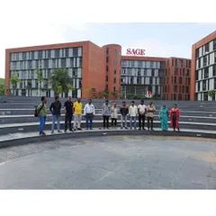 My team and I on-site at the completed amphitheater of Sage University, a central gathering space for students and faculty.