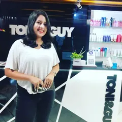A happy client showing off her new haircut. We gave her a fresh, shoulder-length cut with soft layers and a gentle wave for a look that's both stylish and easy to maintain.