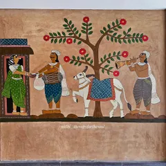 This part of the mural depicts a traditional 'bhikshe' (alms) scene, with a decorated 'basava' (bull) and musicians, bringing a cultural procession to life.