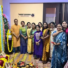 Our academy is more than just a school; it's a community. This moment from our Guru Purnima celebration captures the bond between teachers and students, where we honor the tradition of gratitude and shared learning that defines Sangeet Gurugriha.