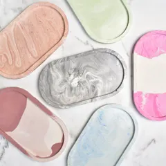 A collection of our oval trinket trays in various marbled colors. Comment below and let me know which one is your favorite.