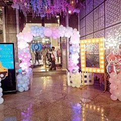 A grand entrance for a Cocomelon themed party. I created a pastel balloon arch and a selfie frame with vanity lights to welcome the guests into the celebration.