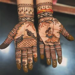 Capturing the joyful spirit of Teej, this design features a woman on a swing on one palm and a pair of birds on the other. The intricate background patterns and shaded details bring the entire festive scene to life.