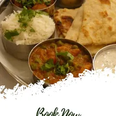 This is what our food looks like when served. A classic North Indian thali with mix veg, rice, and soft naan, just like you would enjoy at home.