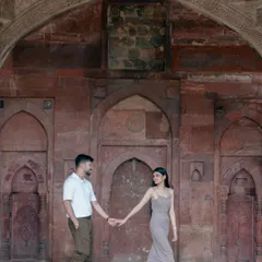 Leading the way through history. This shot at a heritage site in Delhi captures a sense of journey and togetherness, framed by the beautiful rustic textures of the past.