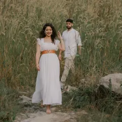 The pure, uninhibited joy of running through a field together. My goal is to create a space where you can be yourselves, resulting in candid engagement photos that are full of life and laughter.