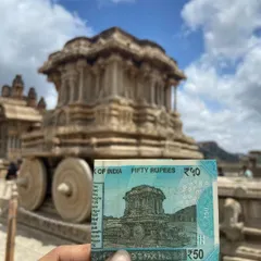 The famous stone chariot at the Vittala Temple in Hampi, as seen on the 50 rupee note. We make sure you get this iconic shot.