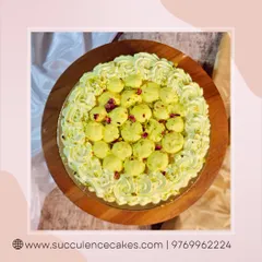 This top-down view shows another way I present my Rasmalai Rabdi Cake, covered with a beautiful arrangement of mini rasgullas and sprinkled with dried rose petals. It’s an Indian emotion, reimagined as a celebratory cake.