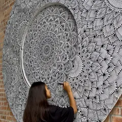 A close up shot of me working on the intricate patterns of the Malaysia mural. Every single detail was hand drawn on site over 200 hours.