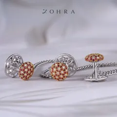 For the man who appreciates fine detail, I design accessories that make a statement of character. These custom cufflinks are crafted in white gold, featuring a dome of hand-set rubies and diamonds. They are more than an accessory; they are a personal signature of confidence and style.