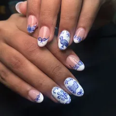 Art is where I have the most fun. I love hand-painting tiny details, like this blue and white design inspired by classic pottery. Each element, from the birds to the delicate bows, is carefully painted to create a unique, wearable piece of art.