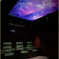 Another angle of our custom home theater, highlighting the dramatic effect of the fiber optic and printed galaxy ceiling. This feature adds a unique visual dimension, making movie nights truly magical.