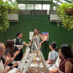 Just me, behind a mic, being my goofy self. Hosting these paint parties is genuinely my happy place.