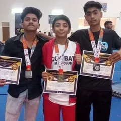 The proof is in the results. I am incredibly proud of our students who compete and win at the highest levels. Here are some of our champions displaying their medals and certificates from a national MMA championship.