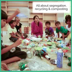A group of children learning all about segregation, recycling, and composting in one of our workshops. We use real-world items to make the lesson tangible and easy to understand.